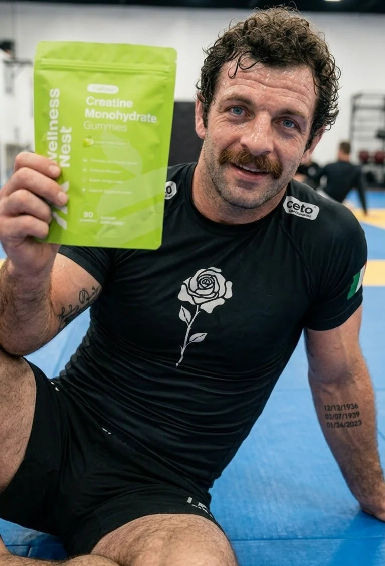 Mike Moretti, Wellness Nest co-founder, on a jiu-jitsu mat holding a FusiForce Creatine Gummies pouch