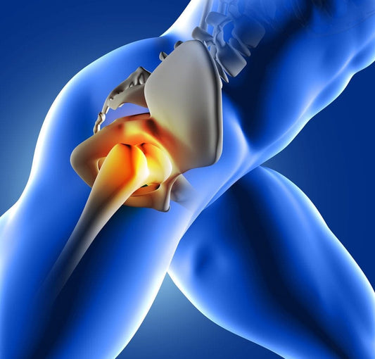 Woman holding her hip during menopause-related joint pain