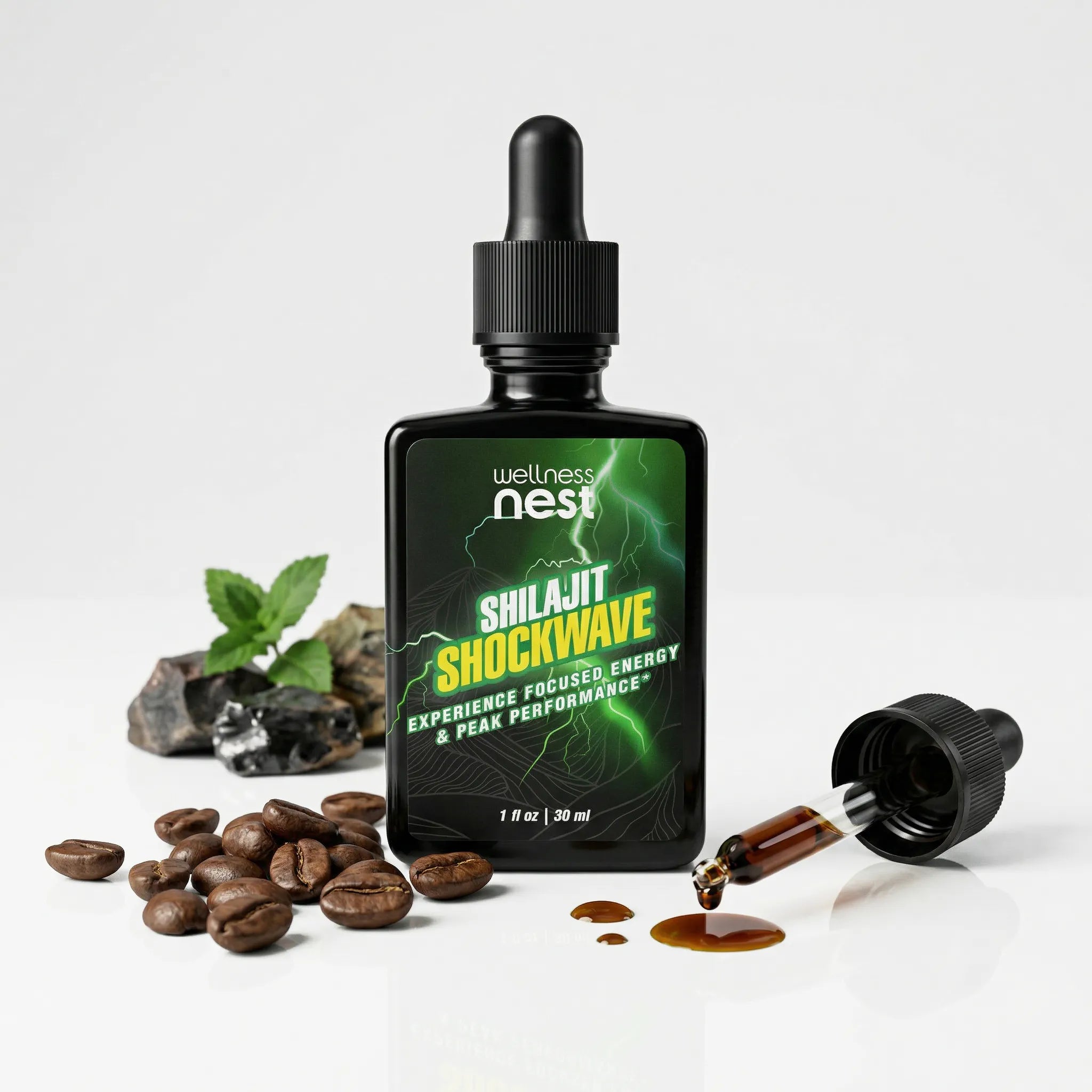 Wellness Nest Shilajit Shockwave supplement bottle with dropper on a white background